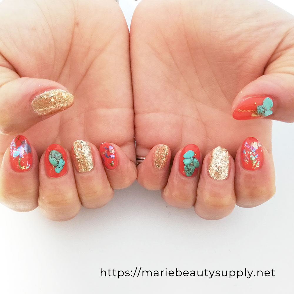 Exotic nails Fired Up with foil and Turquoise Stones. Nail Art Gallery by MARIE BEAUTY SUPPLY.