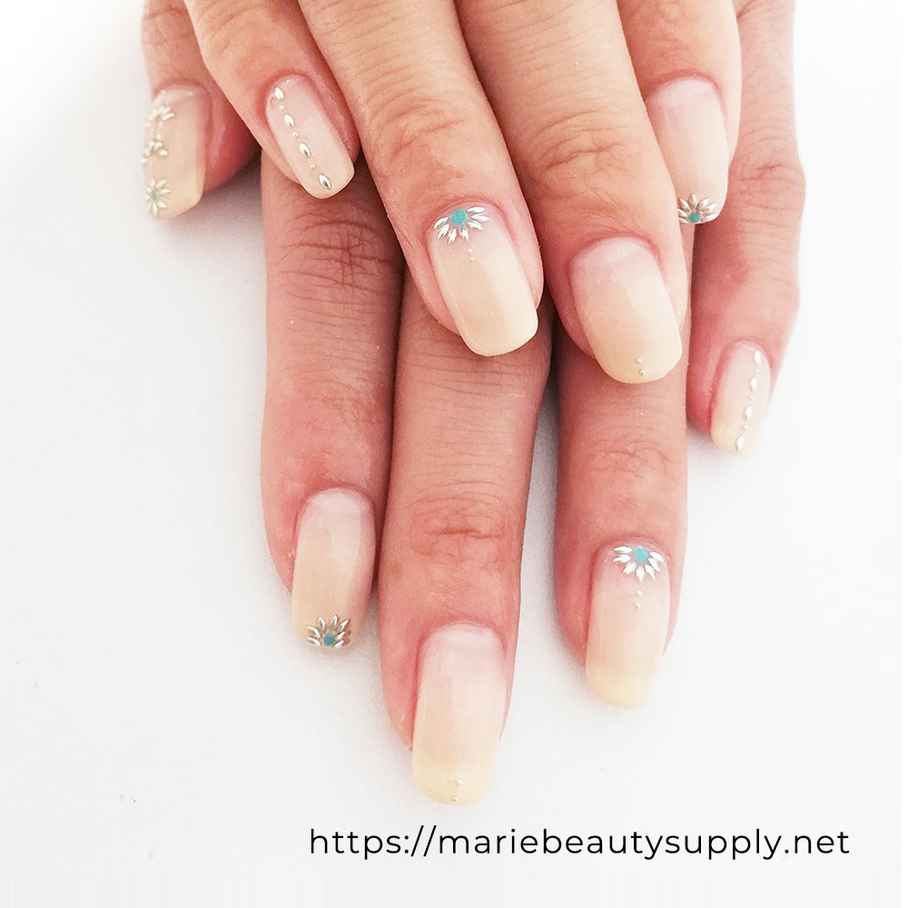 Modest nails with Casual Studded art and Classic Gradation. Nail Art Gallery by MARIE BEAUTY SUPPLY.