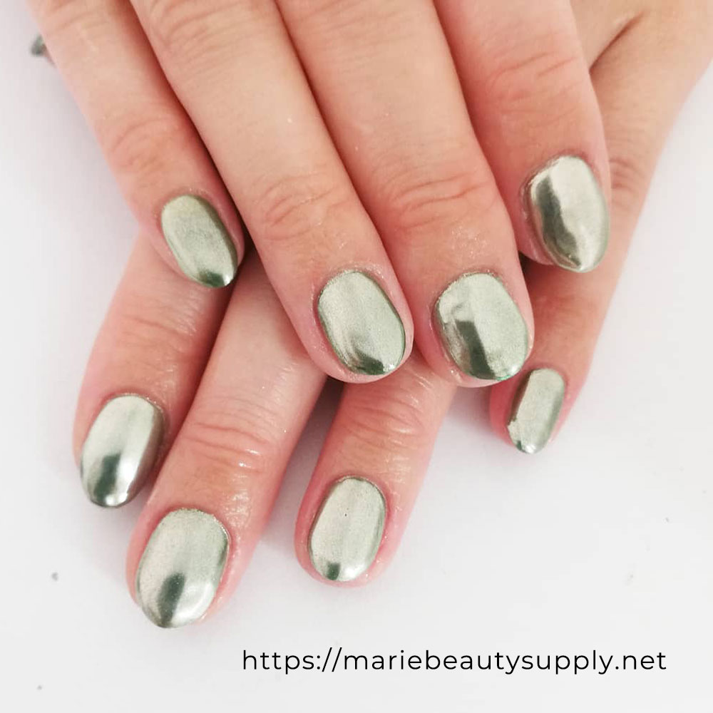 Slightly Colored Green Mirror Nails. Nail Art Gallery by MARIE BEAUTY SUPPLY.