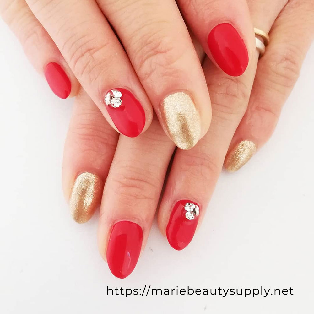 Elegant in Red and Gold. Nail Art Gallery by MARIE BEAUTY SUPPLY.