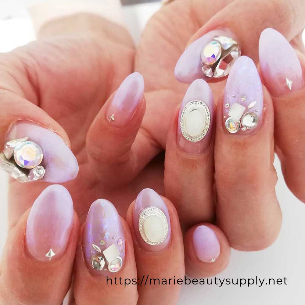 Glittering Gradation with SWARVOSKI bejewels. Nail Art Gallery by MARIE BEAUTY SUPPLY.