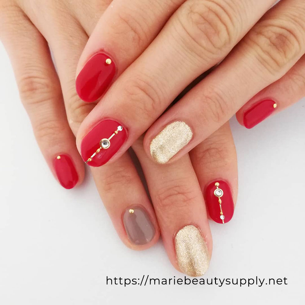 High-Class Nails with Red, Gold, and Beige. Nail Art Gallery by MARIE BEAUTY SUPPLY.