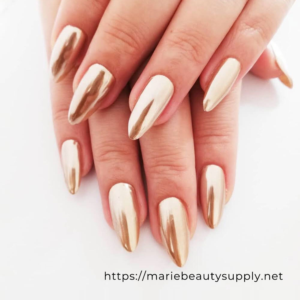 Beautiful Gold Mirror Nail. Nail Art Gallery by MARIE BEAUTY SUPPLY