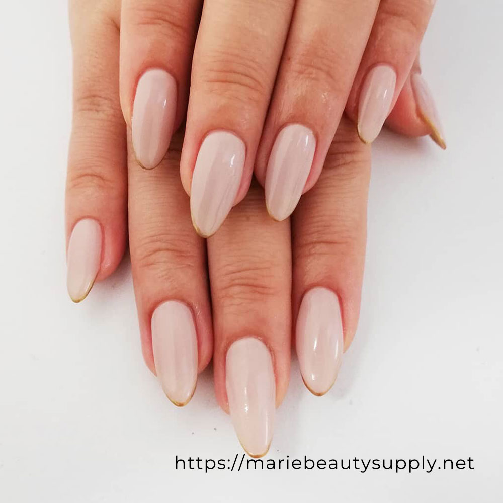 Simple Beige and Gold French Nails.