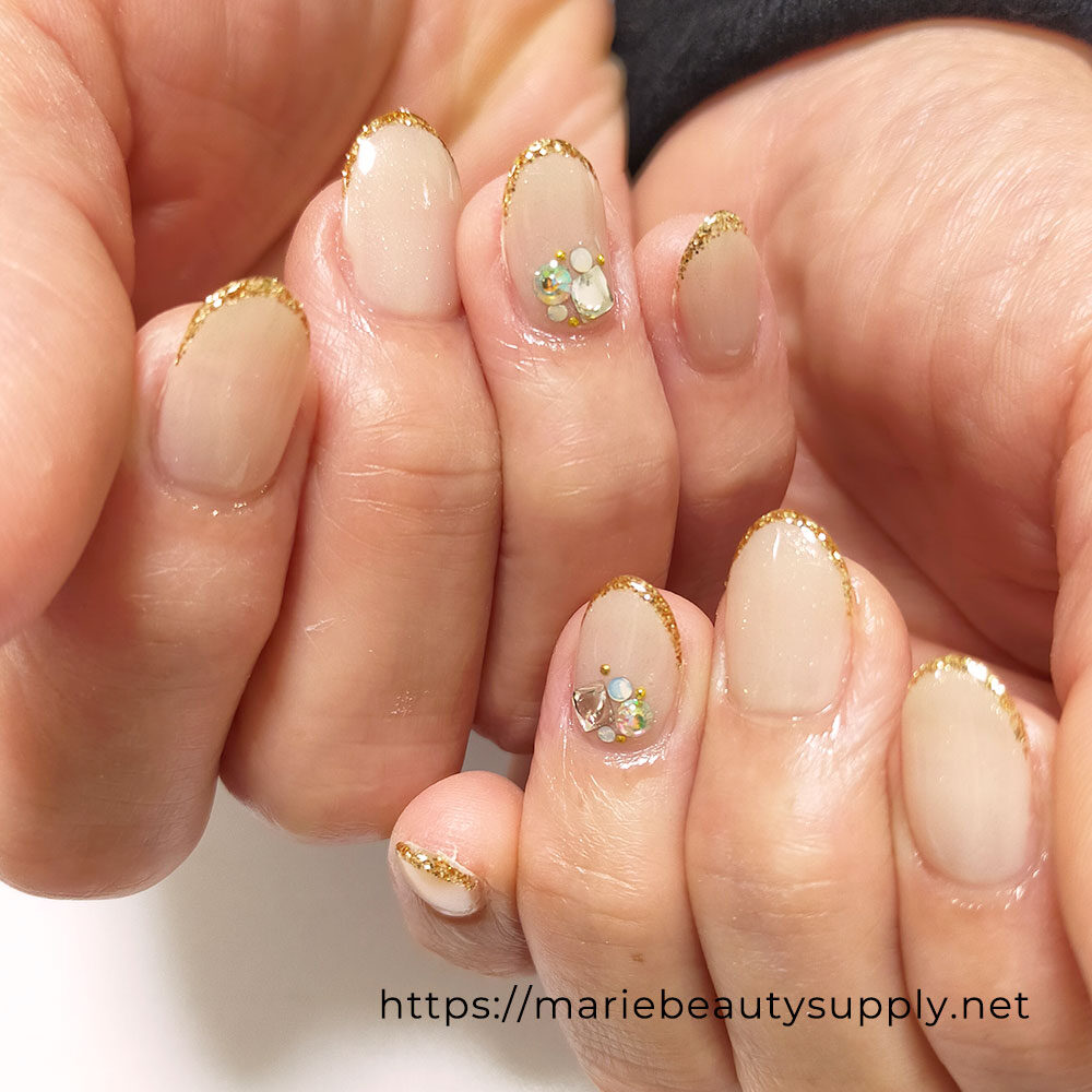 Thin French nails based on sheer color with glitter